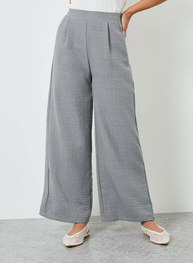 Styli Women Grey Wide Leg Trousers - Image 1